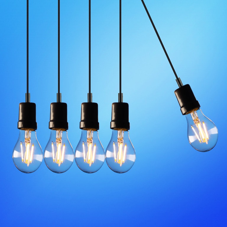 Lightbulbs on blue background